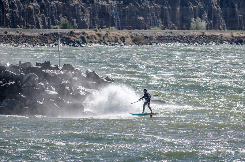 This hydrofoil surfer on a dark swell in the Pacific Northwest :  r/oddlysatisfying